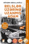 Relslər üzərinə uzanmış adam